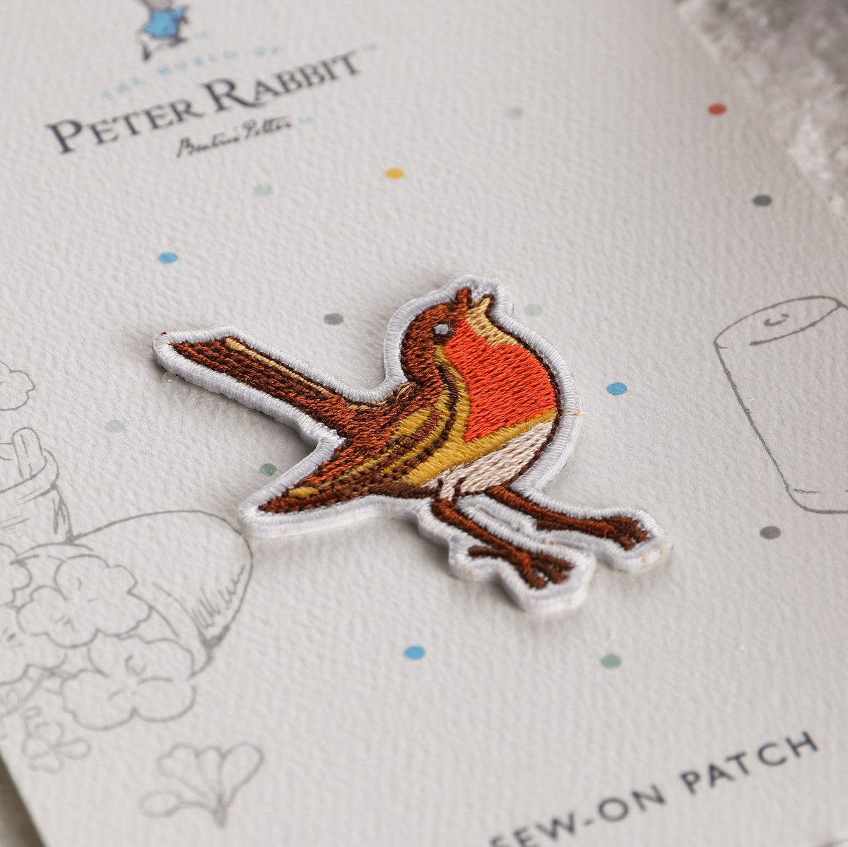 Embroidered robin Christmas patch made by Aspinline