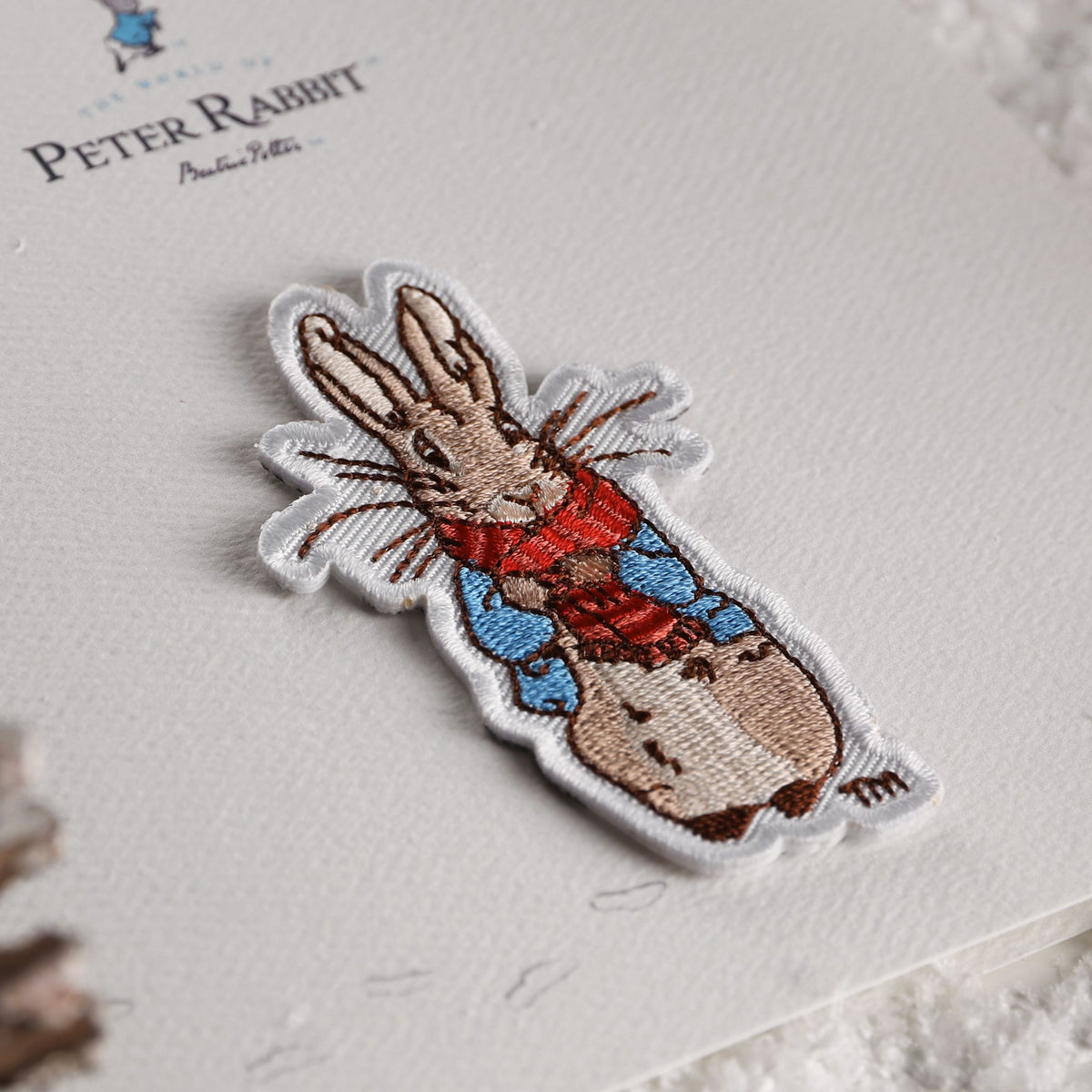 Embroidered Peter Rabbit patch made by Aspinline