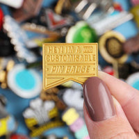 Custom metal die struck pin badges UK