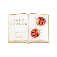 Pomphlett primary school gold reader soft enamel pin badge